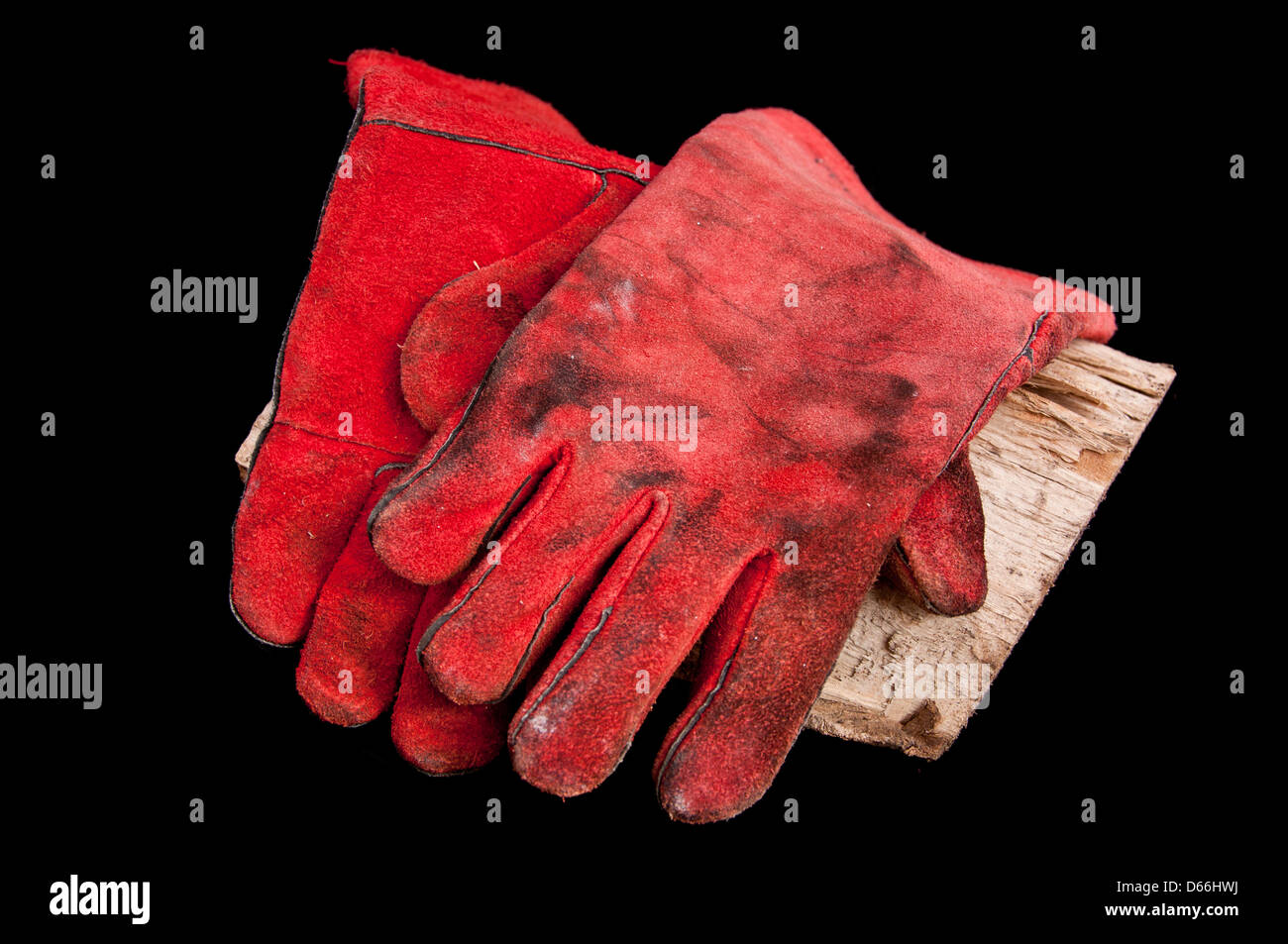 Gants en cuir pour cuisinière poêle à bois Banque D'Images