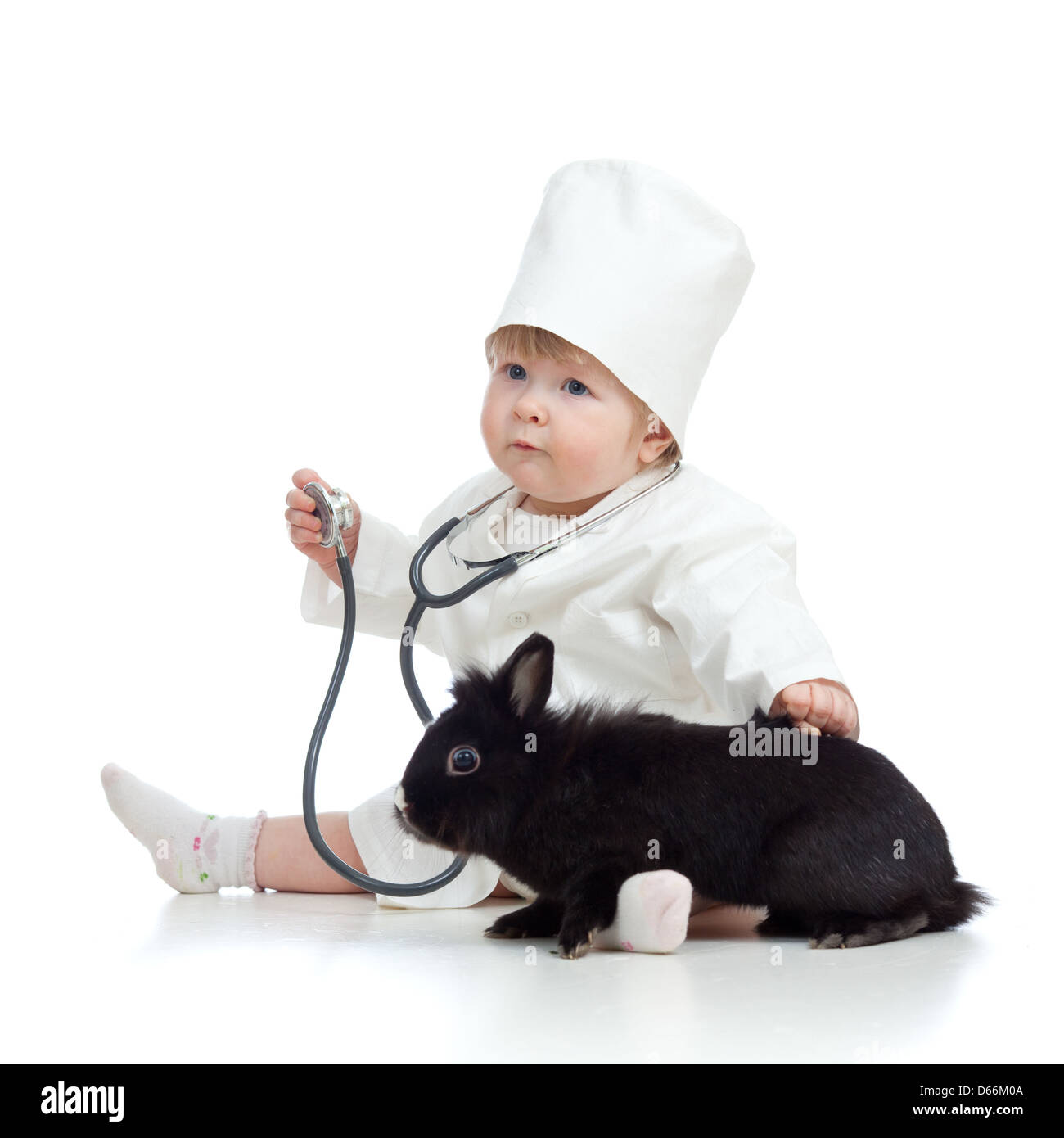 Médecin de l'enfant mignon avec animal isolated on white Banque D'Images