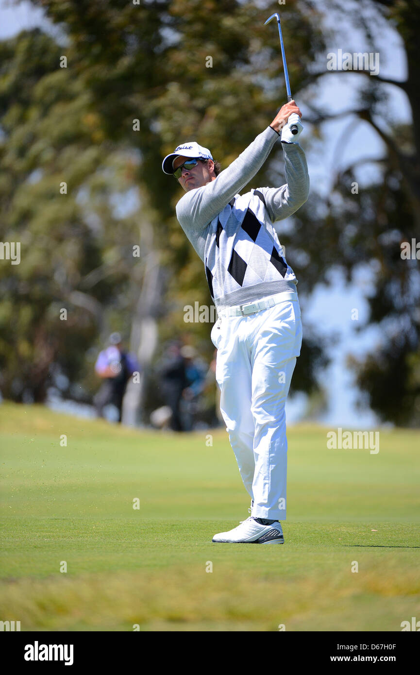 Melbourne, Australie. 16-11-12. Adam Scott (Aus) joue un fer à repasser durant son second tour à l'Australian Masters Banque D'Images