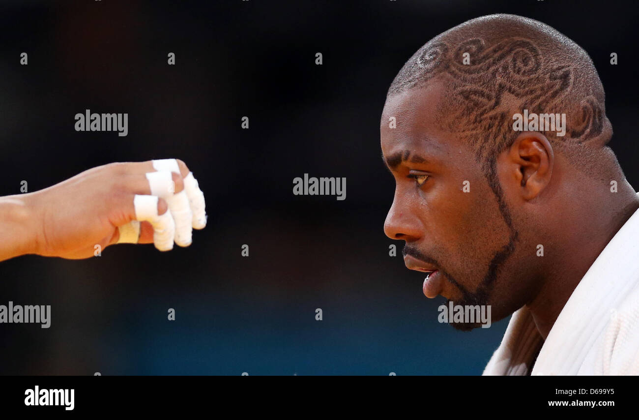 Le judoka Français Teddy Riner se bat contre Kim Sung-Min de Corée du Sud au cours de la demi-finale masculine de  +100kg dans la compétition de judo dans ExCeL Arena au les Jeux Olympiques de 2012 à Londres, Londres, Grande-Bretagne, 3 août 2012. Photo : Friso Gentsch dpa  + + +(c) afp - Bildfunk + + + Banque D'Images