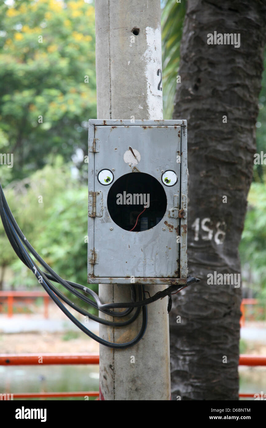 Carte d'électricité avec un visage Banque D'Images