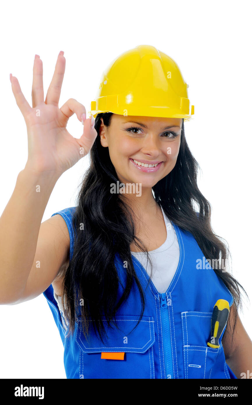 Belle jeune femme les réparations exigées Banque D'Images