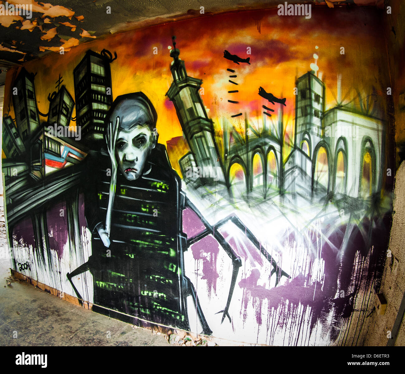 Le Graffiti d'un homme triste dans une zone de guerre thème Banque D'Images
