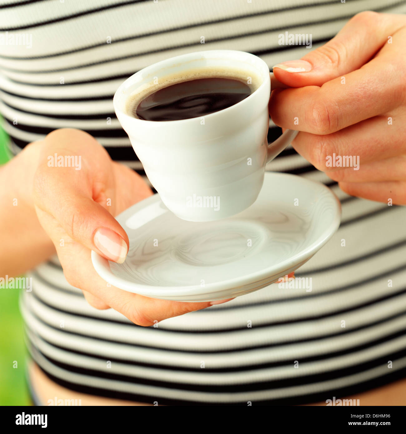 Hands holding espresso Banque D'Images