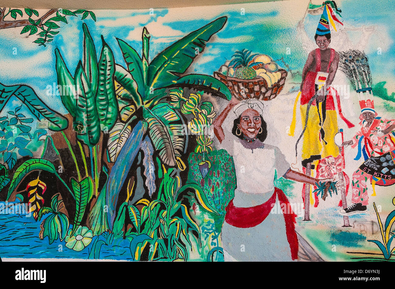 Peinture murale, femme portant un panier de fruits, Basseterre; St.kitts; île des caraïbes Banque D'Images