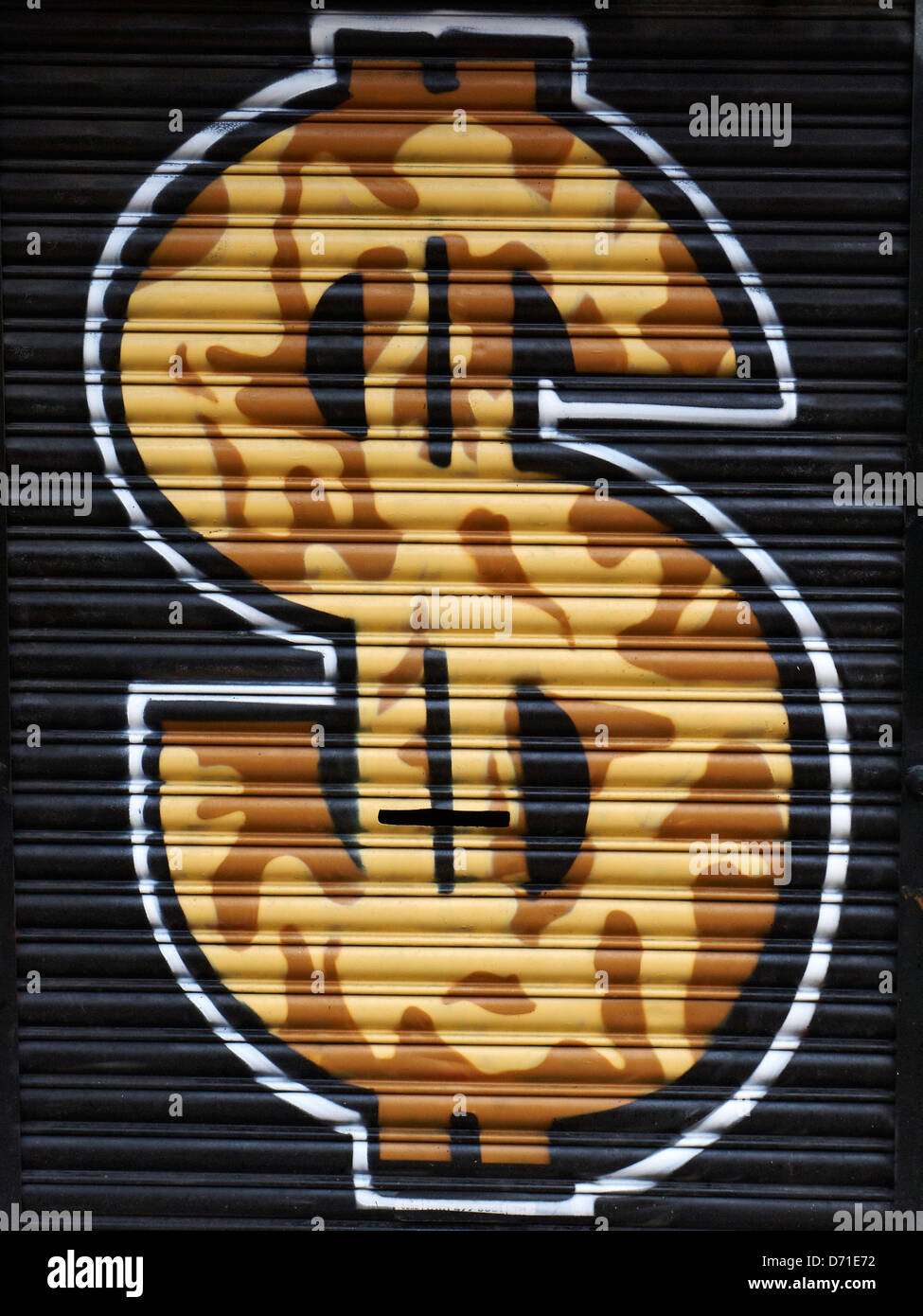 Dollar américain graffiti sur shutter à Manchester UK Banque D'Images