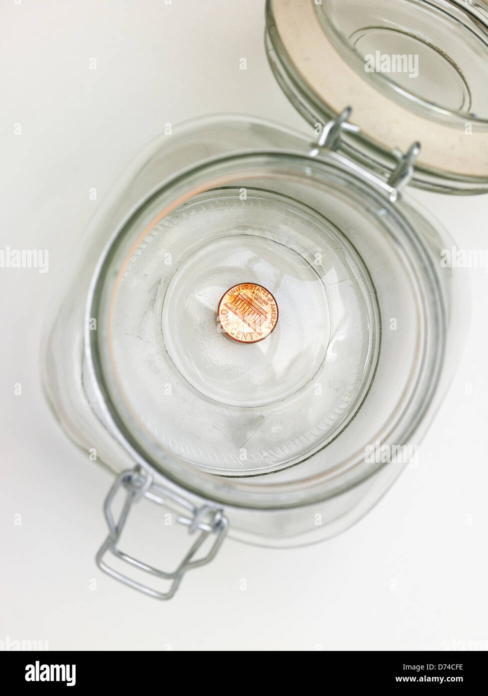 Dernier penny dans un pot Banque D'Images