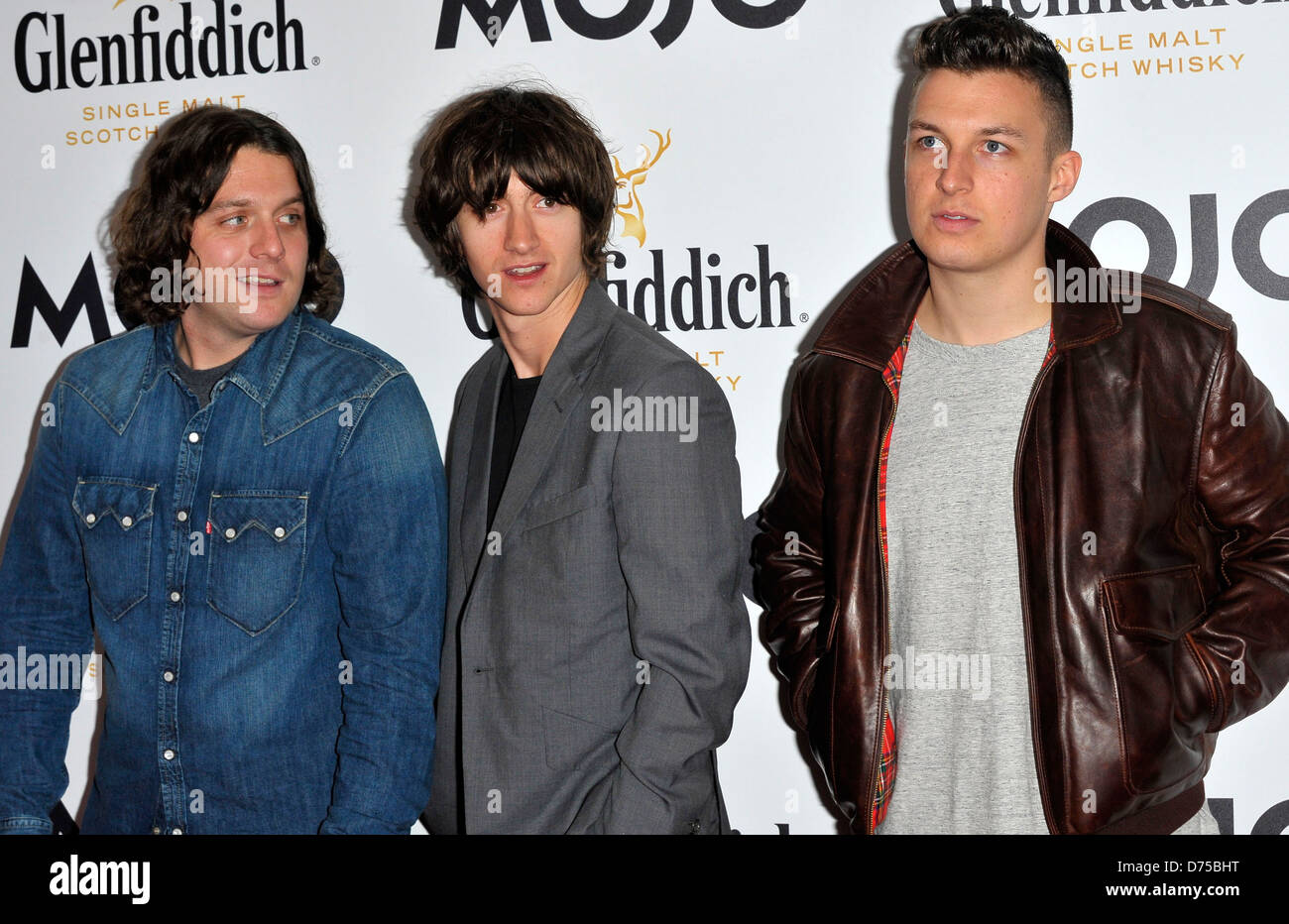 Alex Turner, Matt Helders, Nick O'Malley de Arctic Monkeys Glenfiddich Mojo Honours List 2011 Cérémonie, tenue à la Banque D'Images