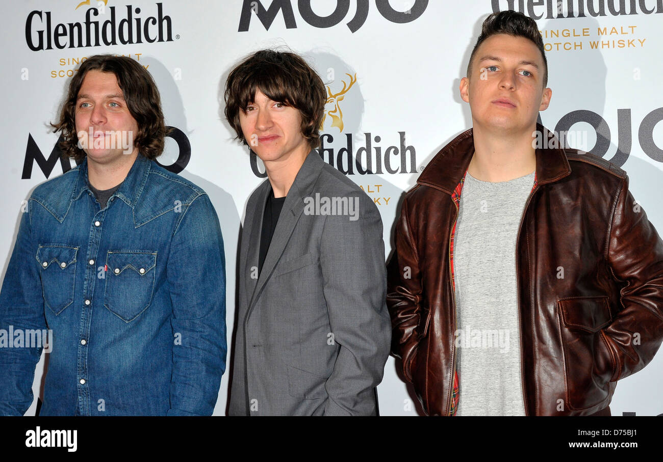 Alex Turner, Matt Helders, Nick O'Malley de Arctic Monkeys Glenfiddich Mojo Honours List 2011 Cérémonie, tenue à la Banque D'Images