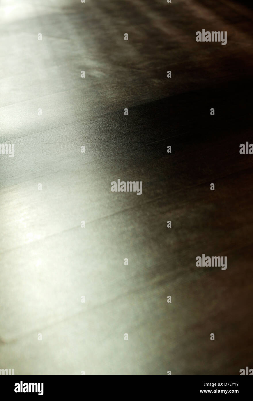 Parquet retour éclairé par la lumière de la fenêtre de l'après-midi diffusée. Profondeur de champ. Banque D'Images