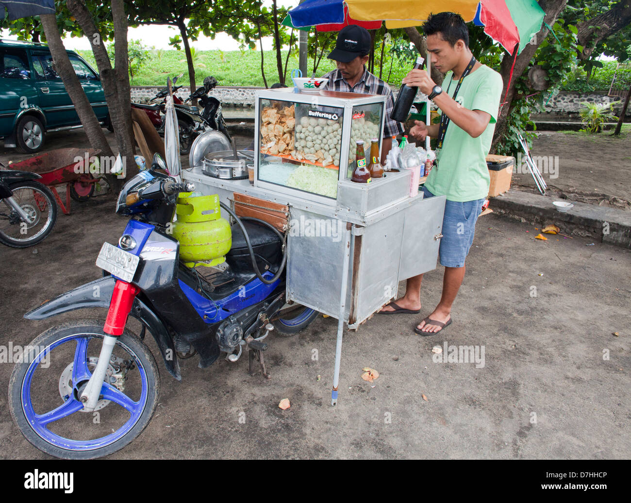 Restaurant mobile sur une moto à Bali, Indonésie Banque D'Images