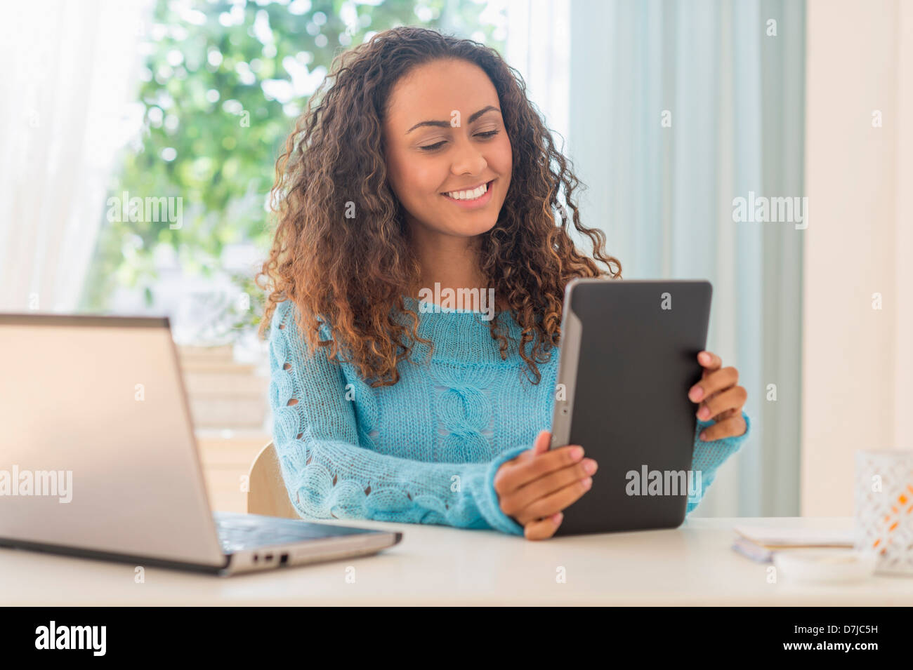 Young woman in home office Banque D'Images