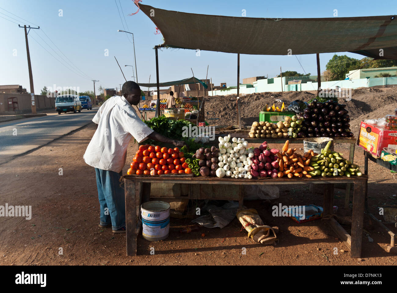 Un vendeur et le stand de légumes, l'île de Tuti, Khartoum, Soudan Banque D'Images