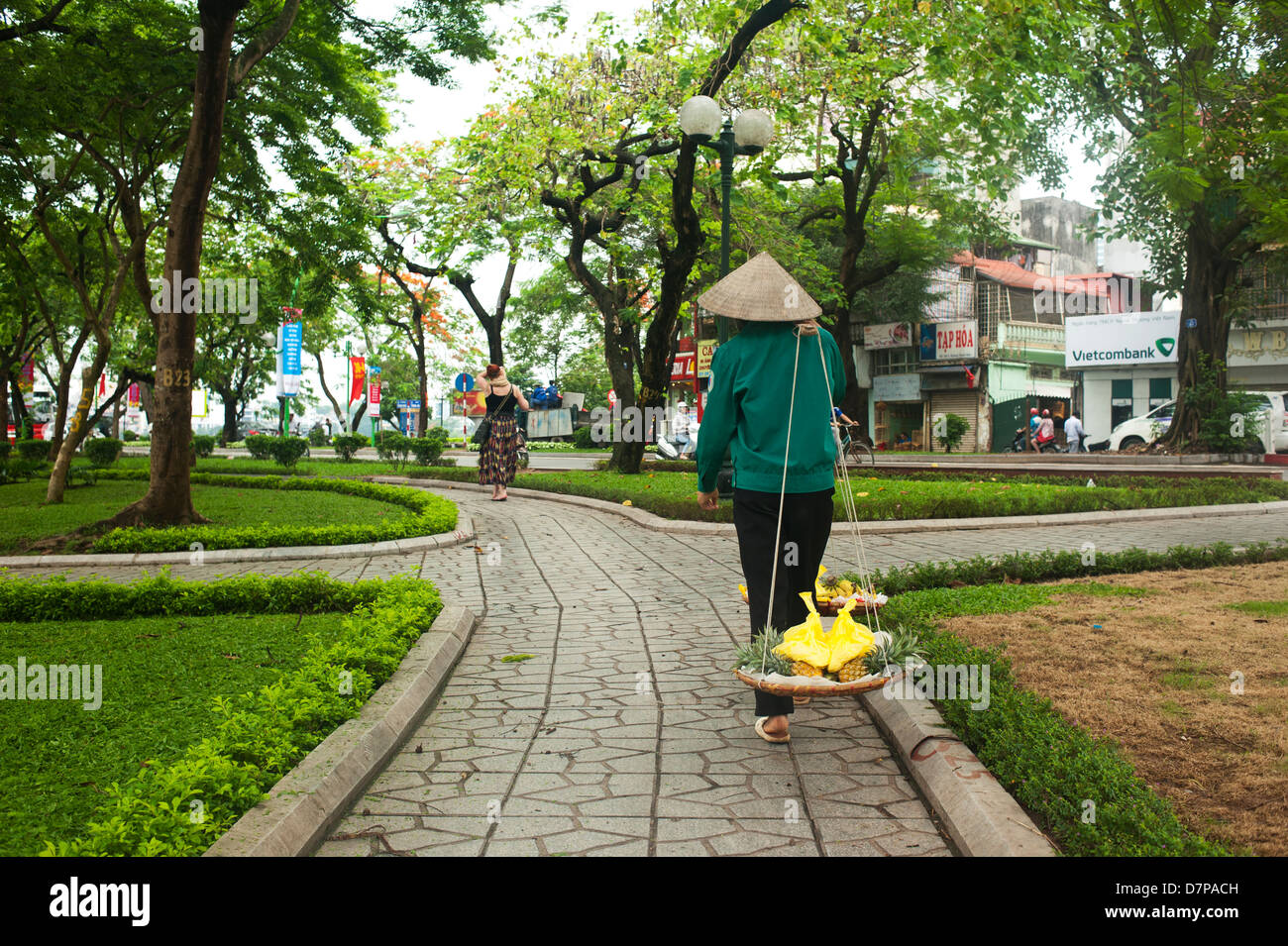 Hanoi, Vietnam - Femme street food vendor Banque D'Images