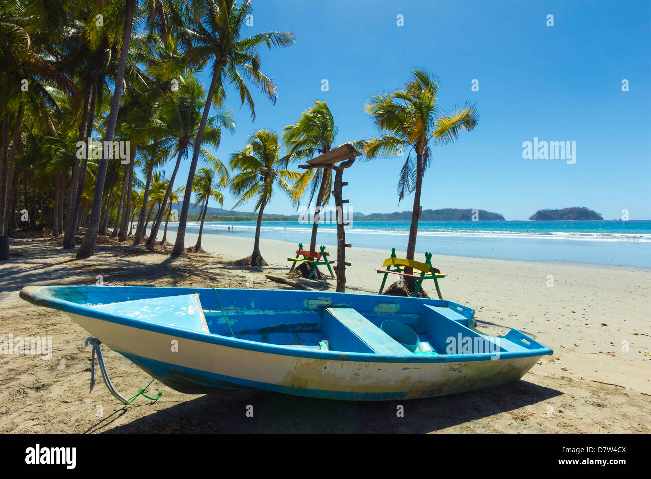 Voile sur la plage bordée de palmiers, à ce village & resort, Samara, Province de Guanacaste, Péninsule de Nicoya, Costa Rica Banque D'Images