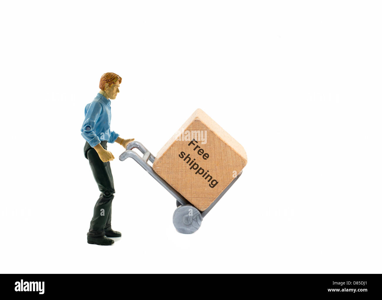 L'homme avec le chariot et le texte de la boîte de transport Banque D'Images