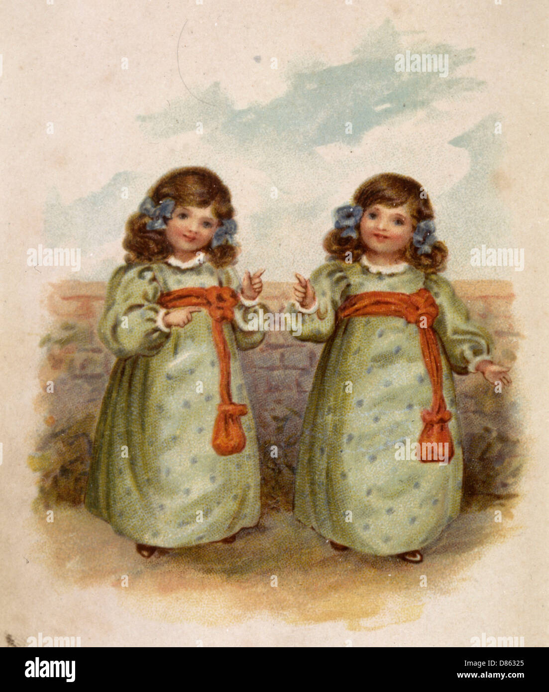 Filles jumelles dans des robes identiques Banque D'Images