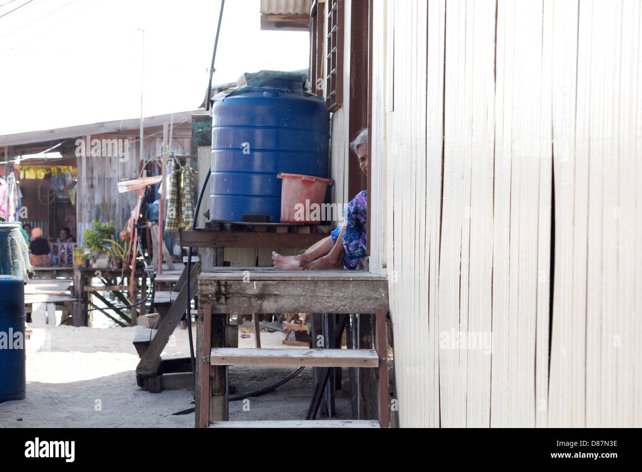 Une vieille femme asiatique Banque D'Images