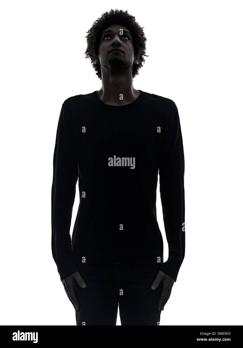 Un beau jeune homme de l'Afrique jusqu'à la silhouette en studio isolé sur fond blanc Banque D'Images