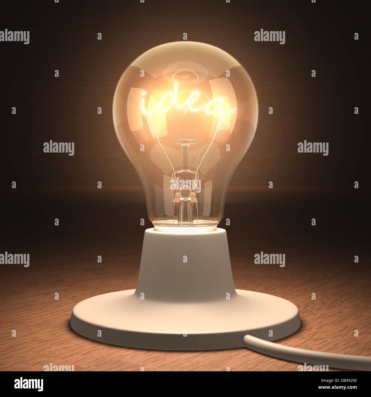 Lampe allumée avec le filament de l'idée en forme de word. Banque D'Images