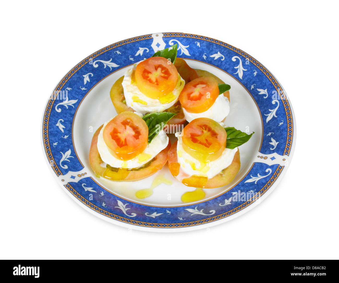 Mozzarella de bufflonne italienne avec des tomates cerises et de basilic. Banque D'Images