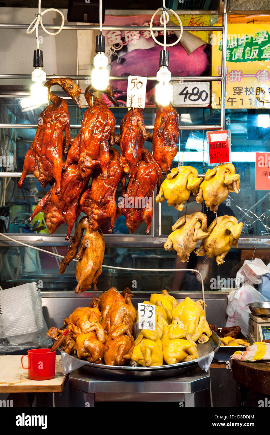 Poulets rôtis étendus dehors un restaurant chinois, Wan Chai, Hong Kong Banque D'Images