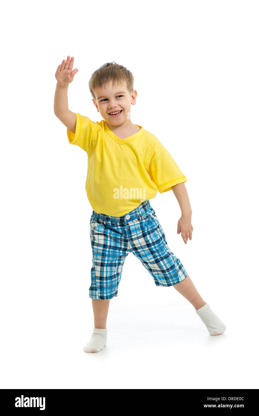 Funny kid boy dancing isolated on white Banque D'Images