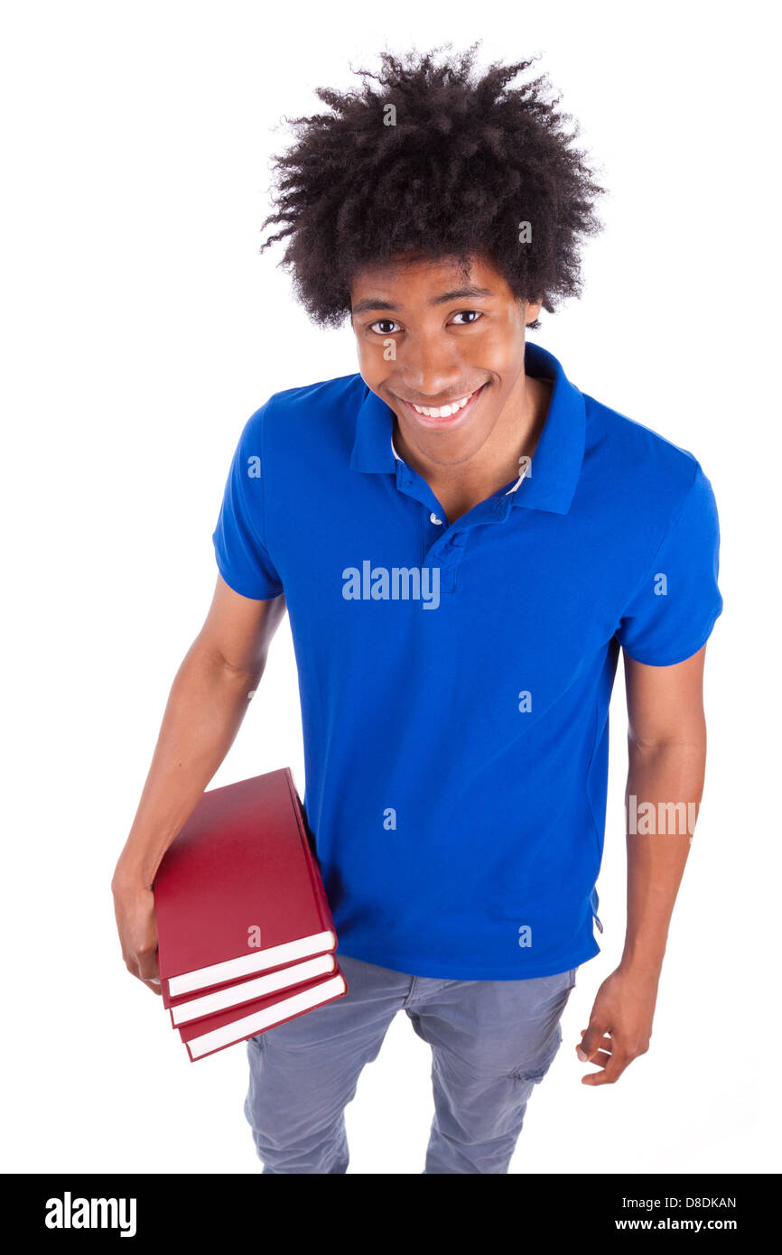 Les jeunes hommes noirs teenage student holding books, isolé sur fond blanc - les peuples africains Banque D'Images