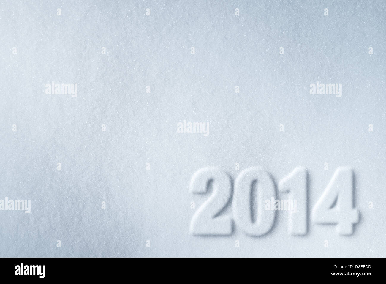 Nouvel an 2014 le symbole imprimé sur fond de neige Banque D'Images