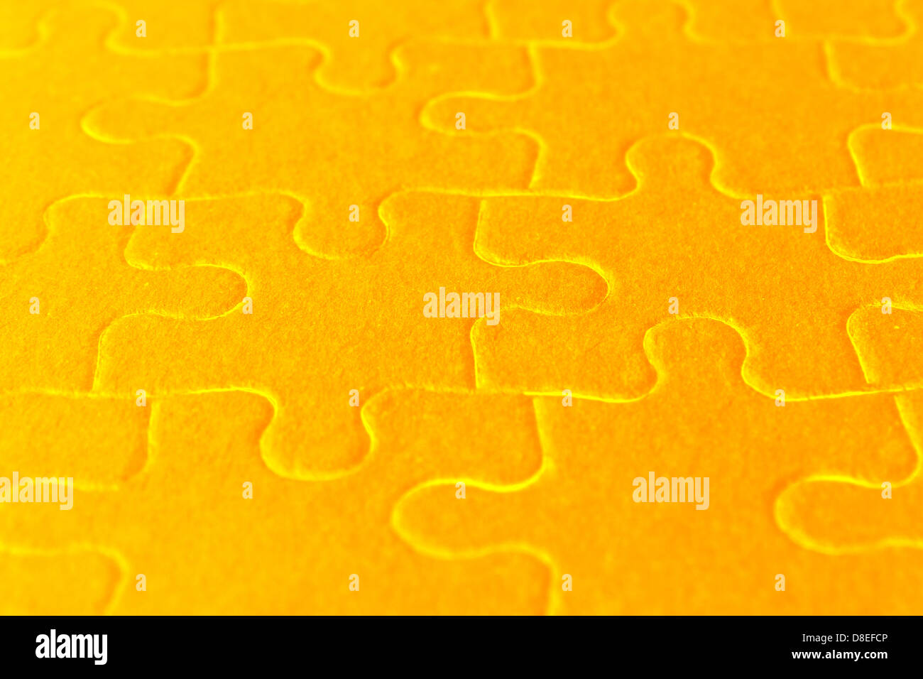 Close up of orange puzzle pieces Banque D'Images