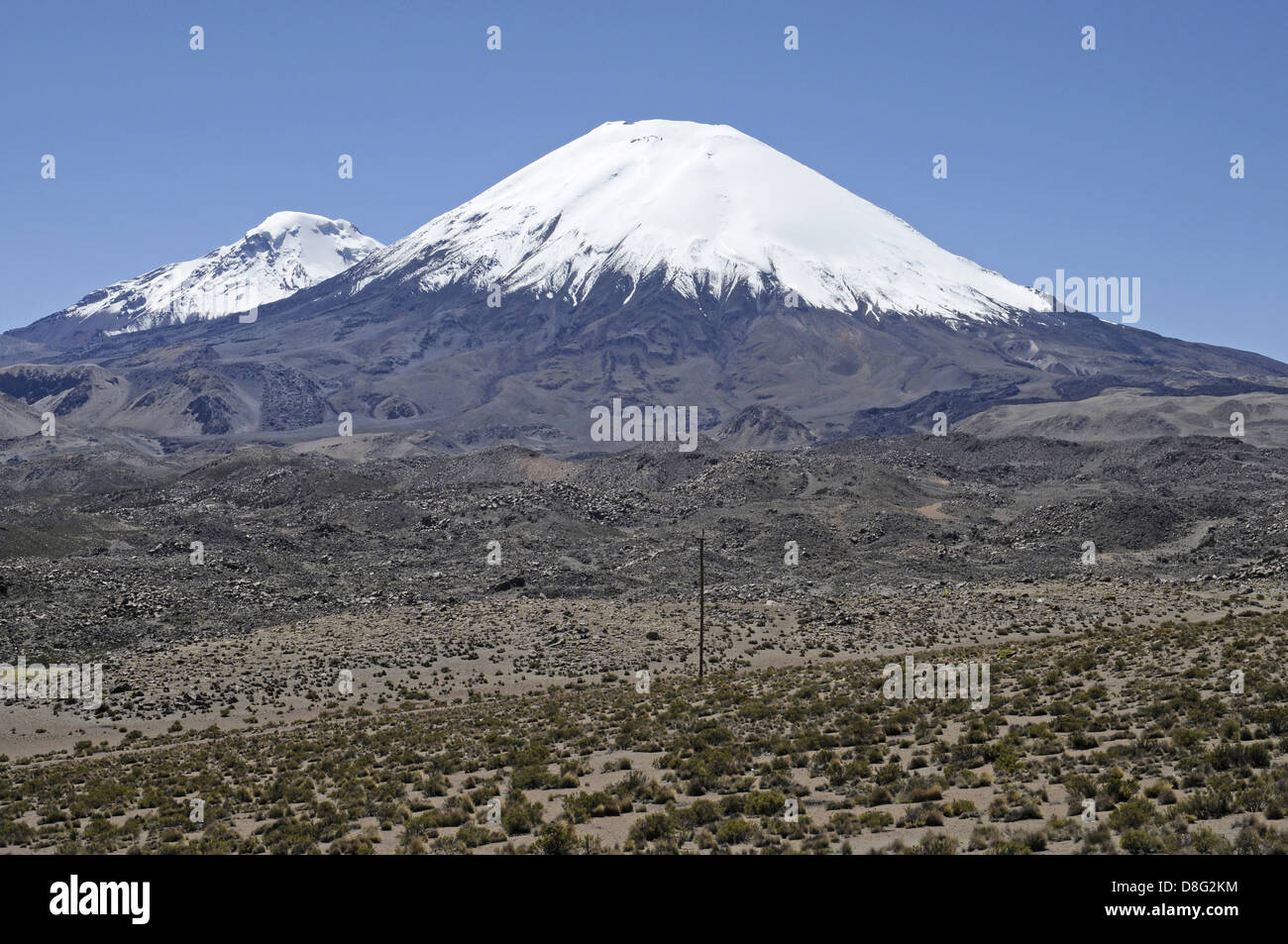 Les volcans Parinacota et Pomerape Banque D'Images