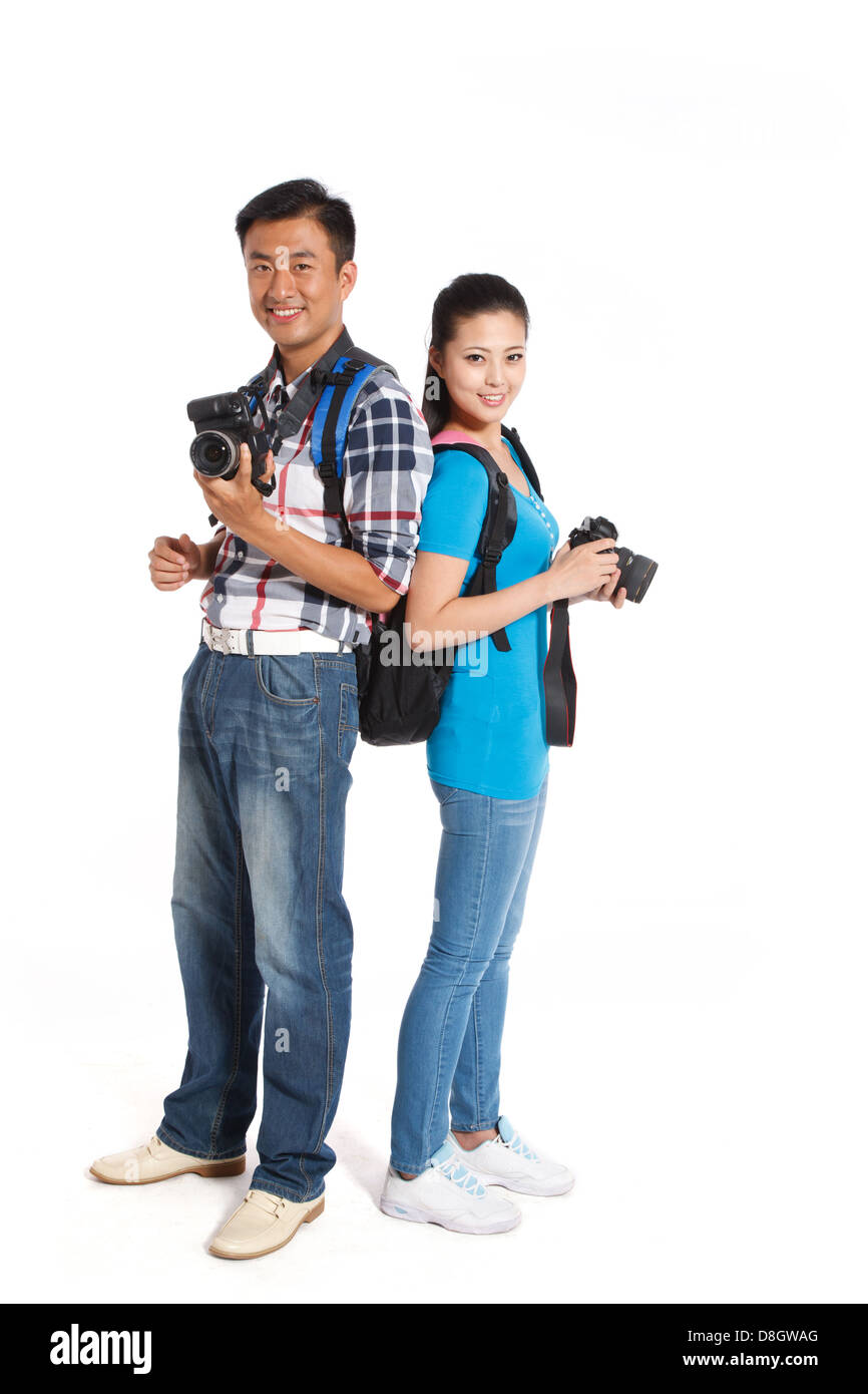 Jeune couple voyageant et exerçant son appareil photo Banque D'Images