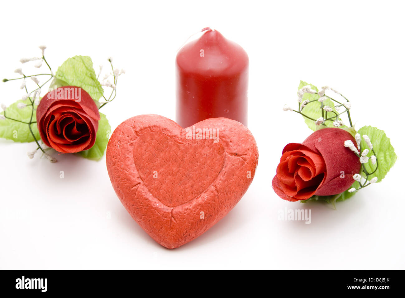 Coeur avec des roses et des bougies Banque D'Images