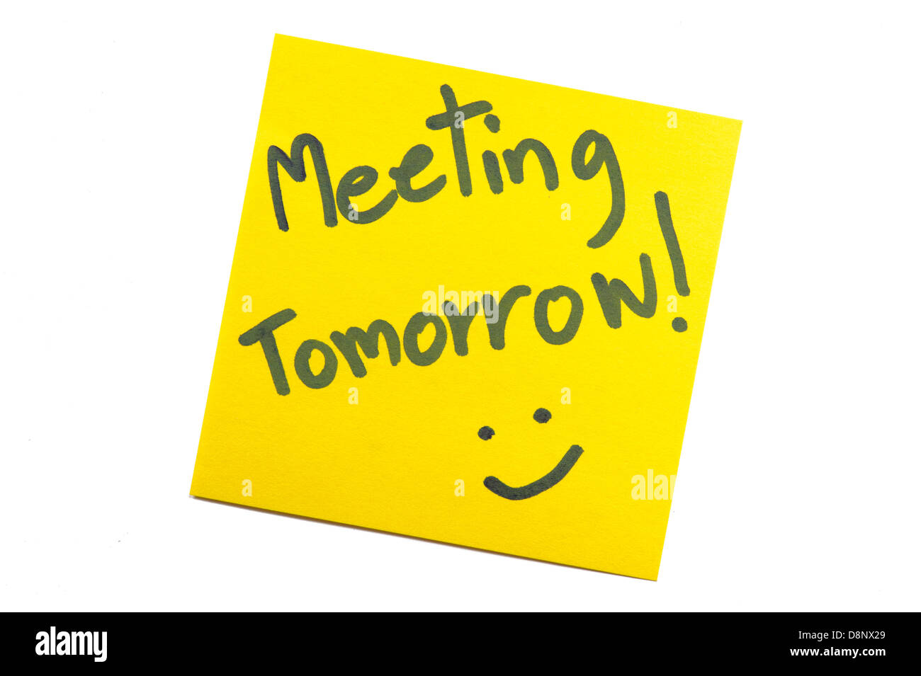 Sticky note avec texte 'Meeting demain' Banque D'Images Sticky note avec texte 'Meeting demain' Banque D'Images