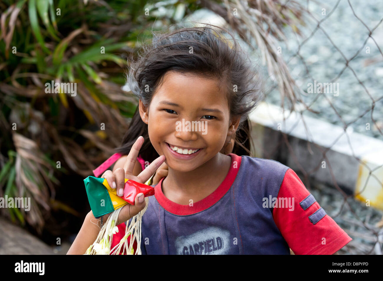 Les enfants dans les rues de Manille, Philippines Banque D'Images