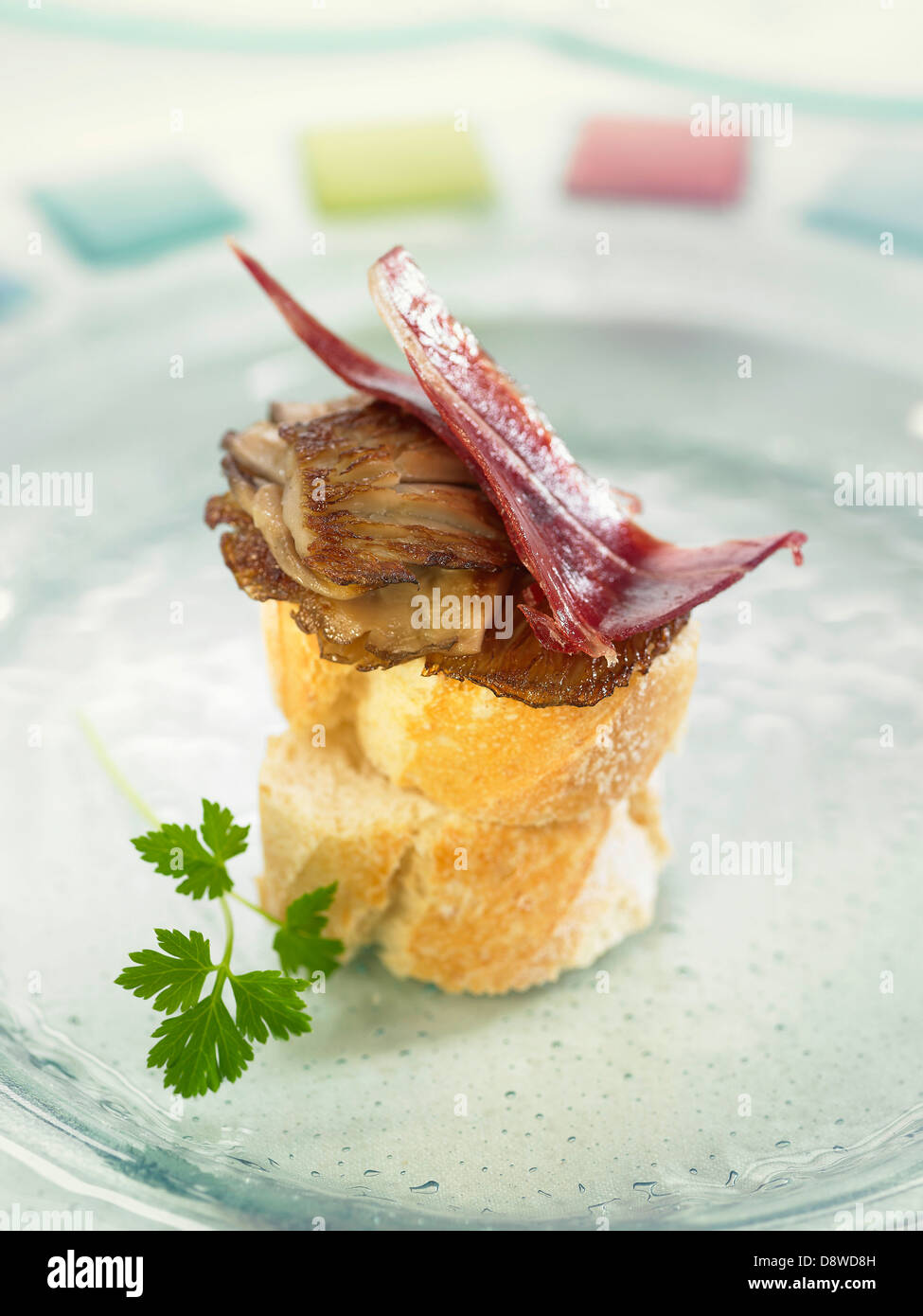 Jambon Serrano et Crostini champignons pleurotes Banque D'Images