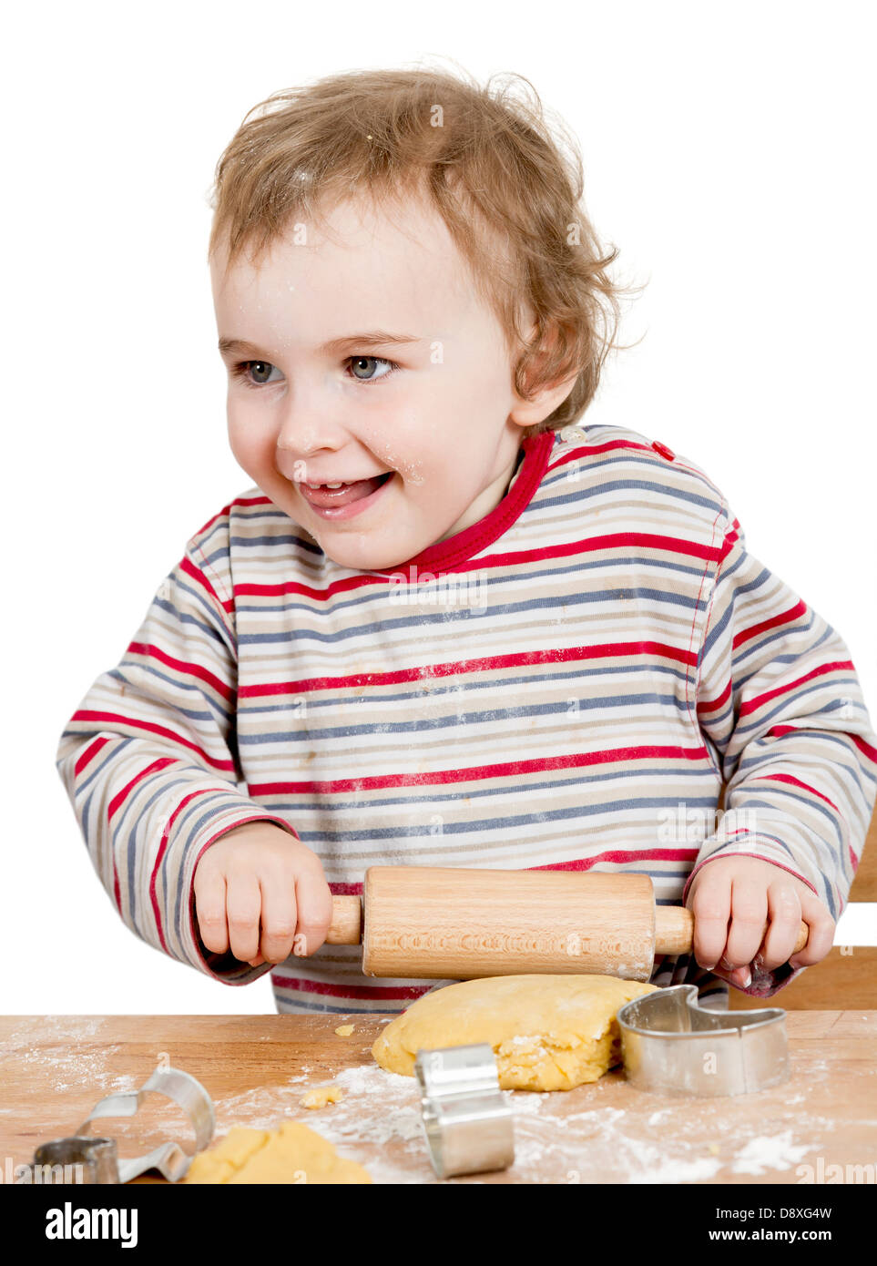 Enfant mignon avec la pâte isolé sur fond blanc horizontal de l'image. Banque D'Images