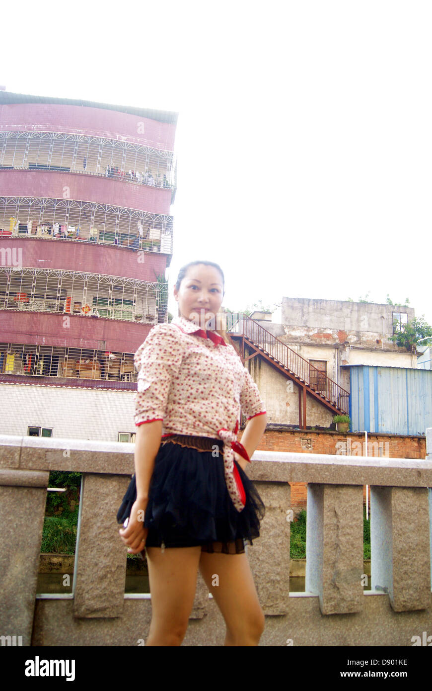 Une femme chinoise, dans la ville de Shenzhen xixiang, endroit tous photo. Banque D'Images