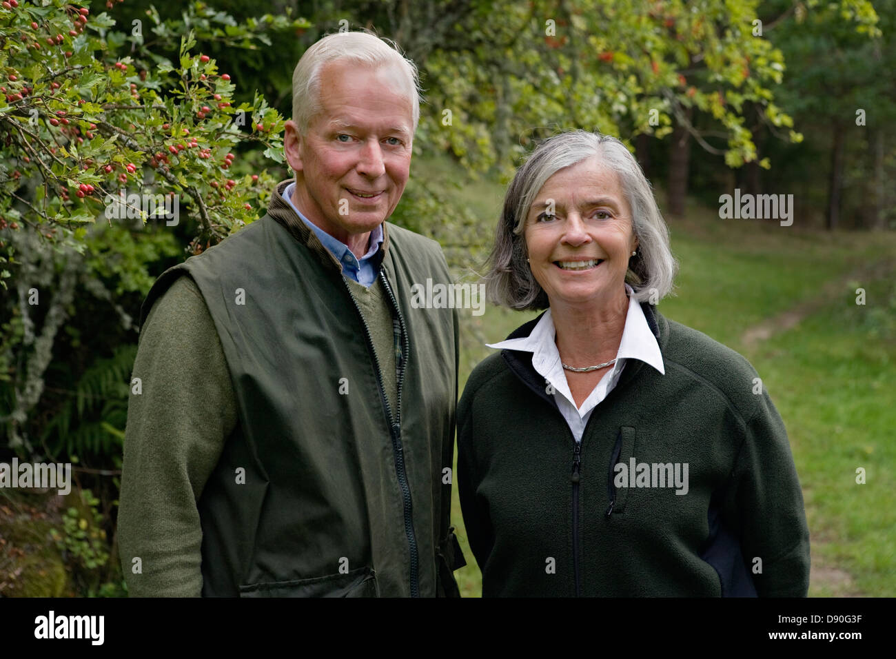 Senior couple smiling, portrait Banque D'Images