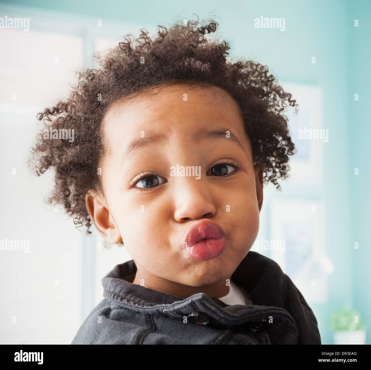 Close up of mixed race boy's face Banque D'Images