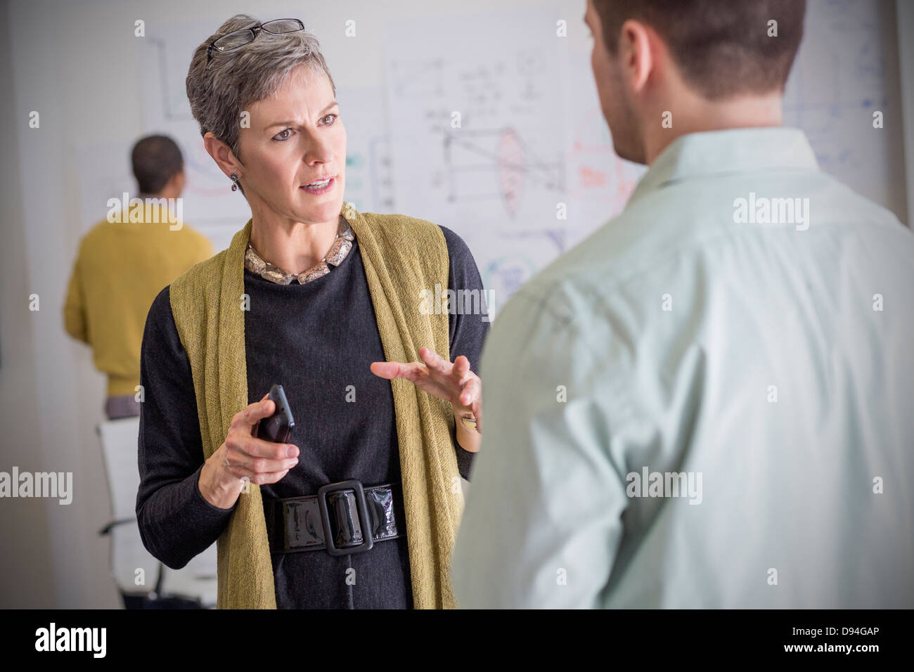 Business people talking in office Banque D'Images
