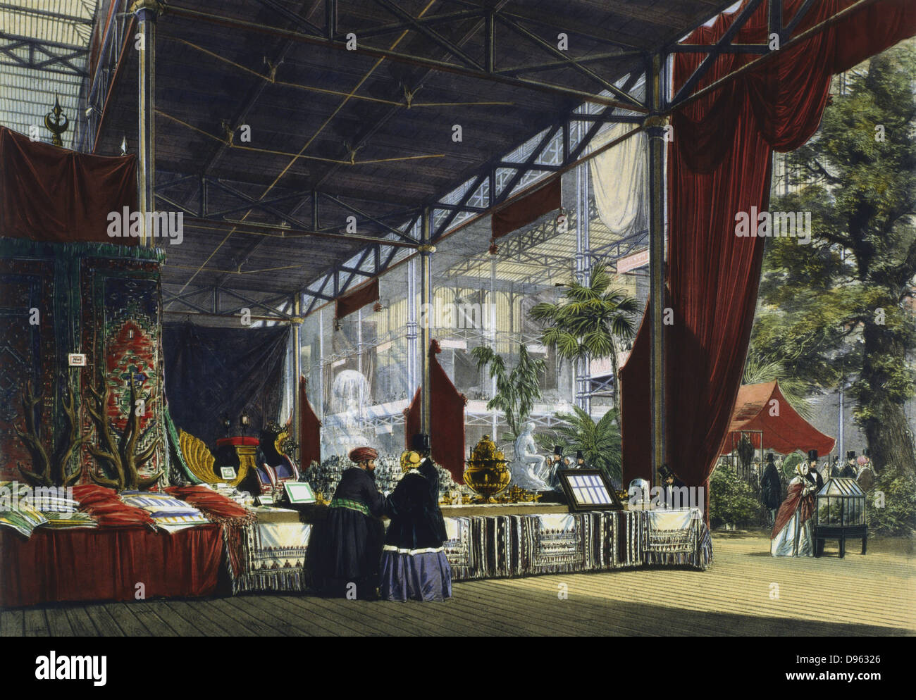 Grande exposition, Hyde Park, Londres, 1851. Vue de l'intérieur du Palais de Cristal montrant deux visiteurs étant montré un stand de produits orientaux. Dans l'angle avant droit un homme et une femme s'admirer les plantes dans un cas Wardian. Gravure en couleur. Banque D'Images