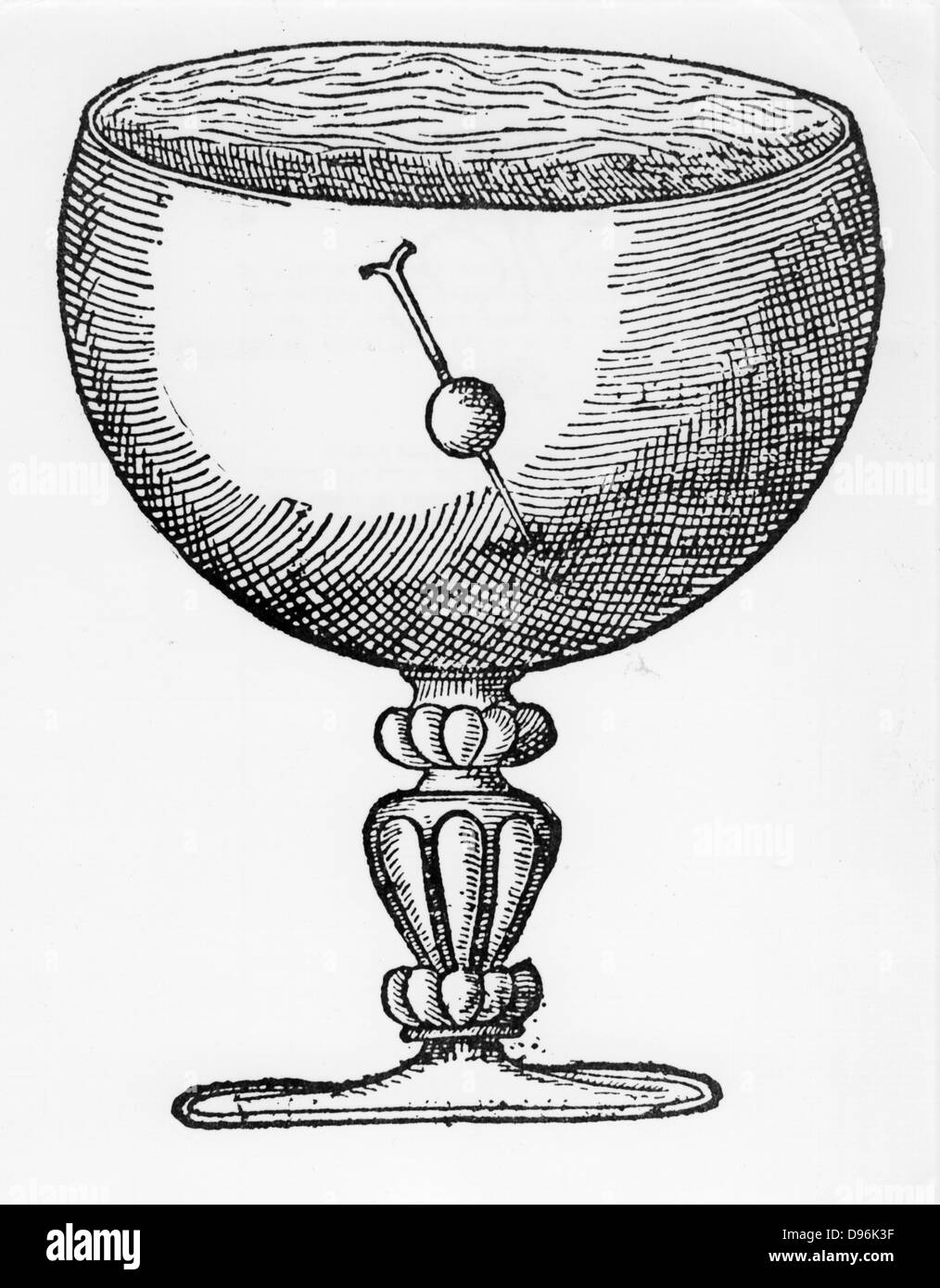 Une aiguille aimantée poussé dans une boule de liège, et flottants immergés dans un gobelet d'eau, plongez et montre la direction de le pôle magnétique. De William Gilbert 'De Magnete', Londres 1600 Banque D'Images