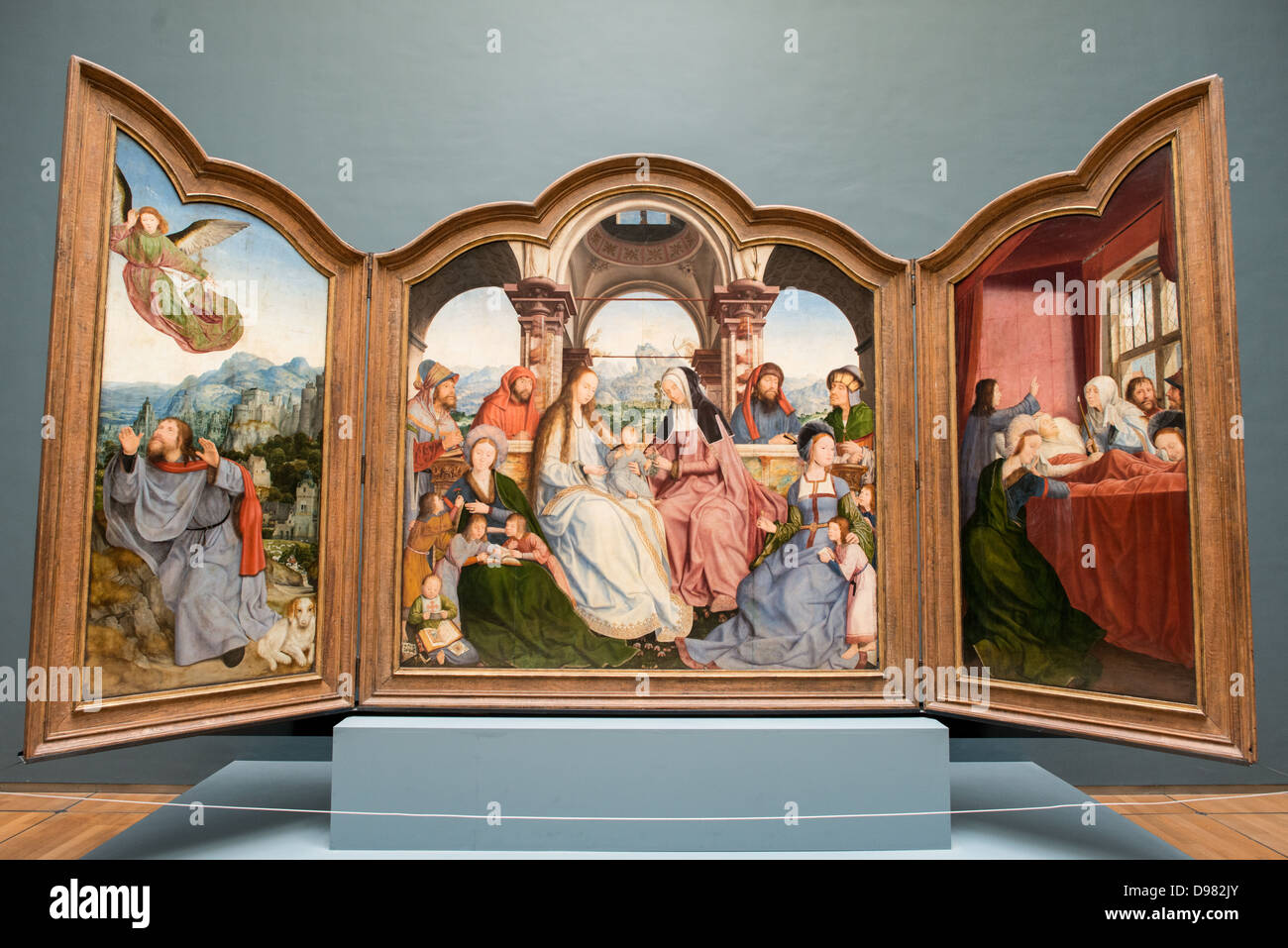 Triptyque de la Confrérie de Sainte-Anne musées royaux Bruxelles // BRUXELLES, Belgique — triptyque du début du XVIe siècle du peintre flamand Quinten Metsys (1465/66-1530) intitulé 'Triptyque de la Confrérie de Sainte-Anne à Louvain' (Triptyque de la Confrérie de Sainte-Anne à Louvain), daté de 1509, exposé aux musées royaux Beaux-Arts de Belgique. L'œuvre a été commandée par la Confraternité Sainte-Anne de Louvain et représente un exemple significatif de peinture religieuse de la Renaissance du Nord. Metsys, également orthographié Massys, était un fondateur de l'école de peinture d'Anvers et connu f Banque D'Images