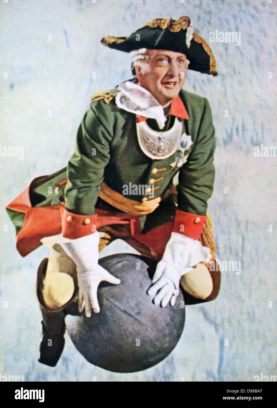Hans Albers comme le Baron de Münchhausen à cheval sur un canon ball. Encore de la langue allemande, de 1943 film basé sur l'histoire du 18ème siècle par R E Raspe. À partir de 'Signal', avril 1943, revue de propagande allemande produite par la Wehrmacht. Banque D'Images