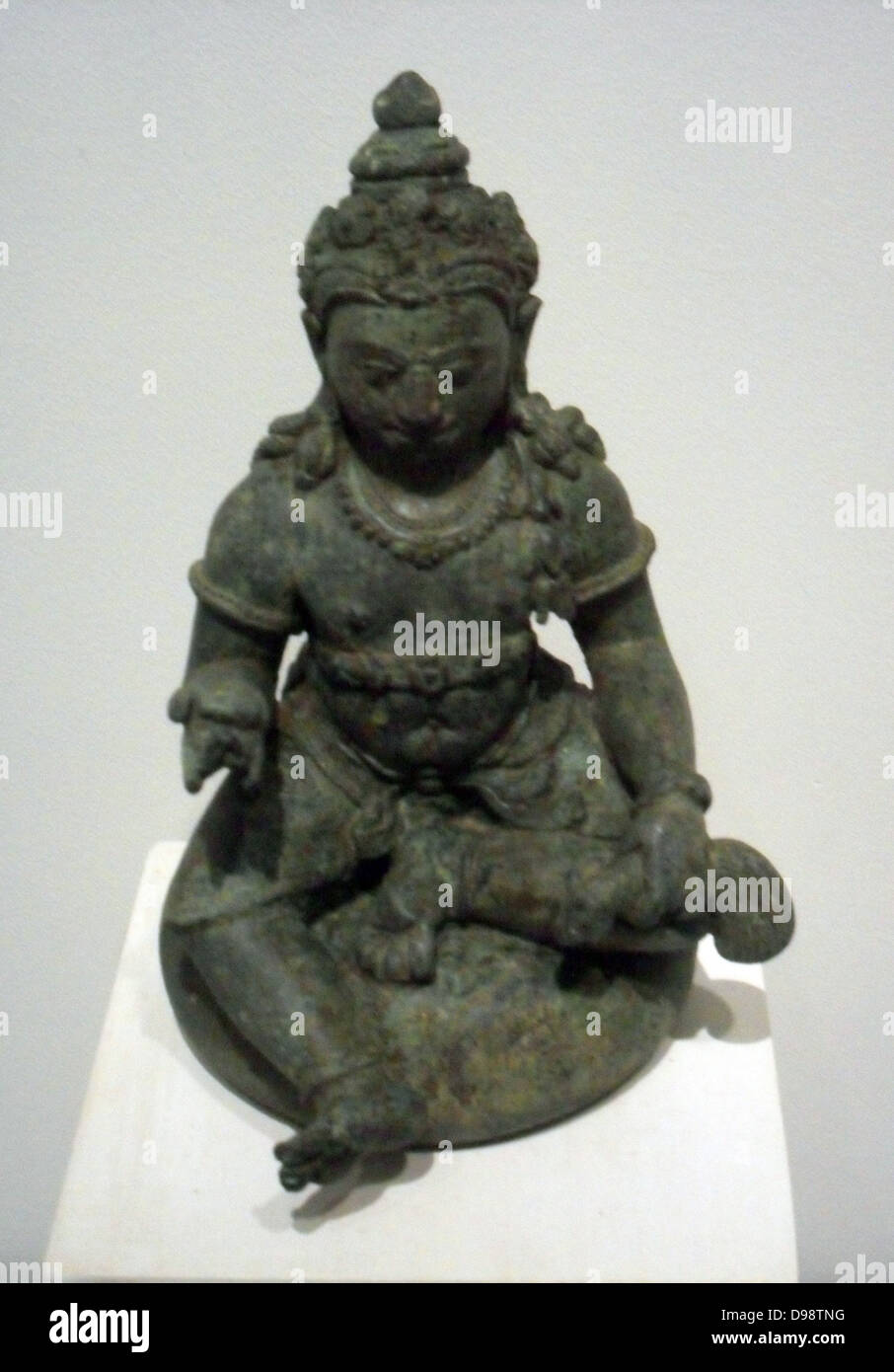 Jambhala Figurine illustrant la richesse-donner forme de Chenresig ou Avalokitesvara, le bodhisattva de la compassion. 9e siècle, bronze, sculpture du centre de Java en Indonésie. Banque D'Images