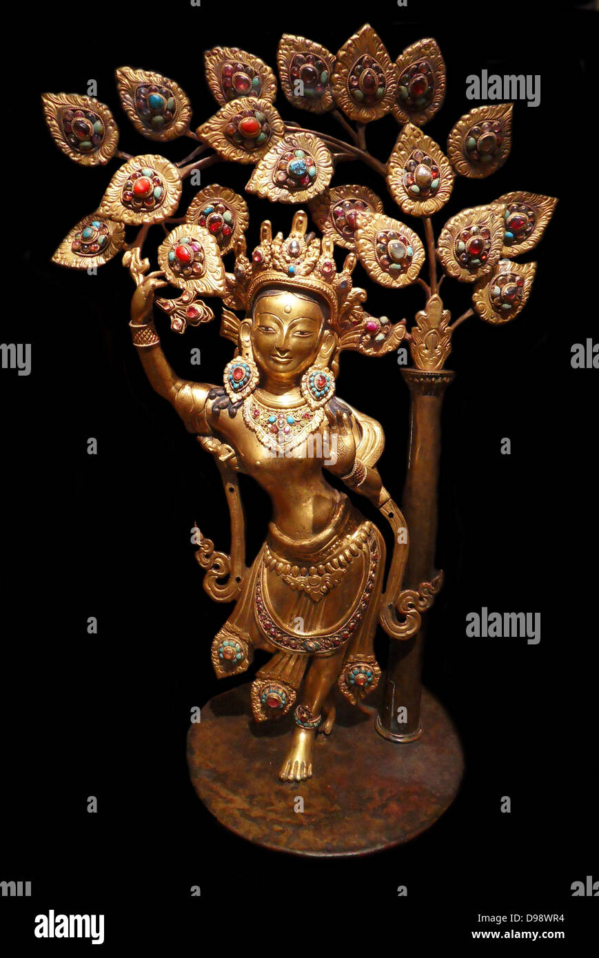 La reine Maya Devi donnant naissance au Prince Siddhartha, le futur Bouddha Cakyamuni. 19e siècle laiton, cuivre sculpture du Népal Banque D'Images
