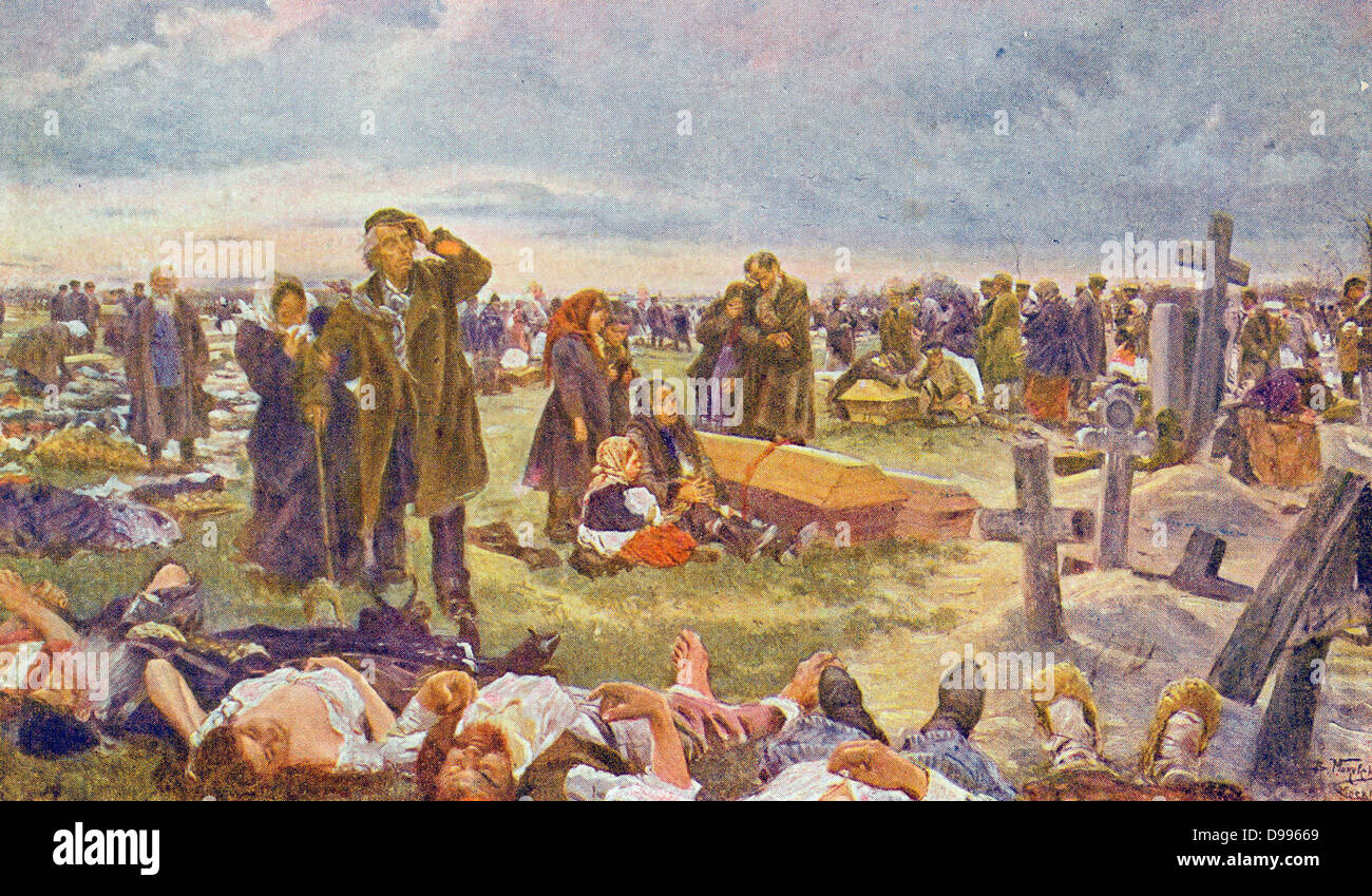 Carte postale de Russie montrant l'enterrement de masse de civils après une attaque allemande vers 1942 Banque D'Images