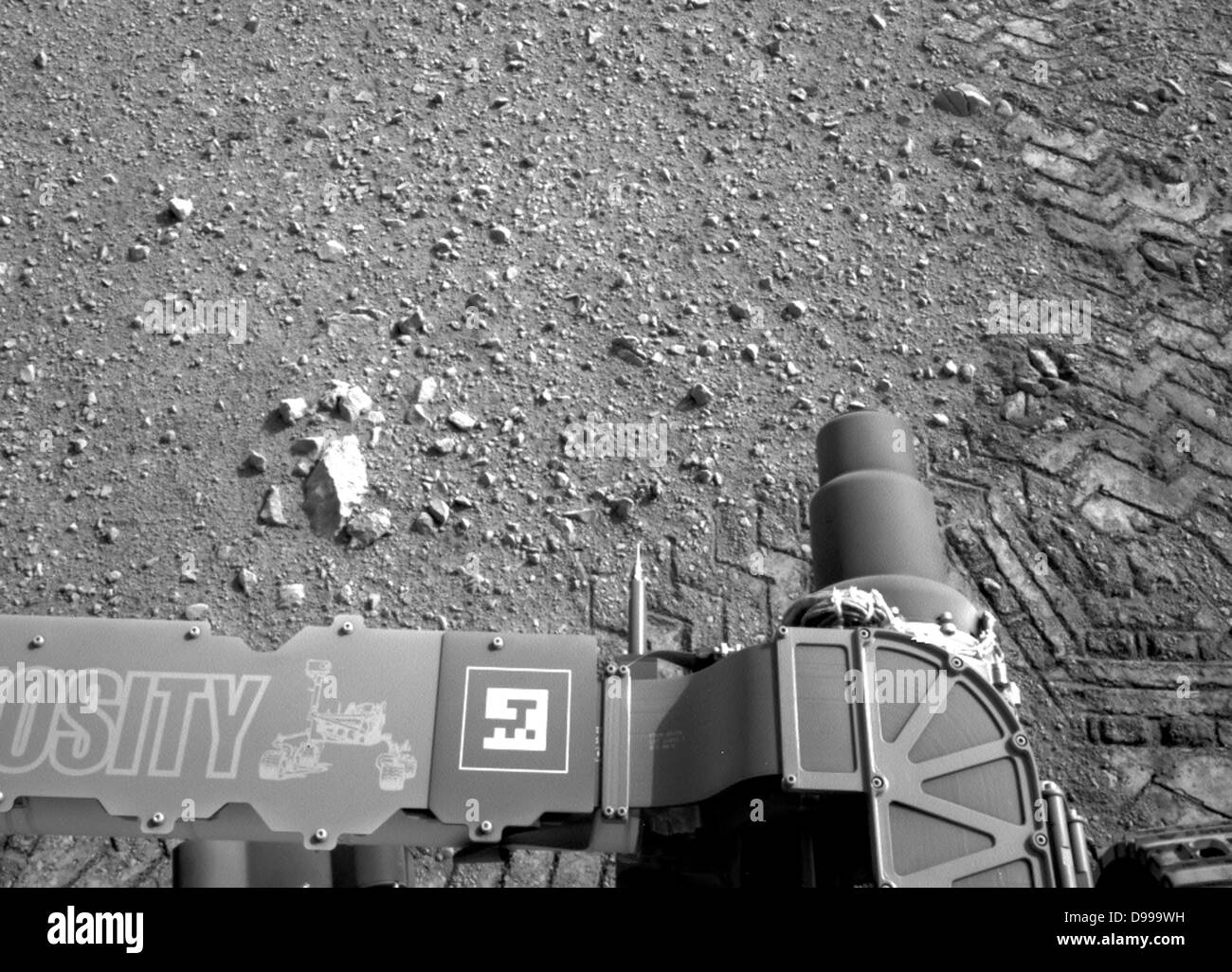 Les lignes droites dans la curiosité sont des marques de pistes en zigzag le code Morse pour JPL. Banque D'Images