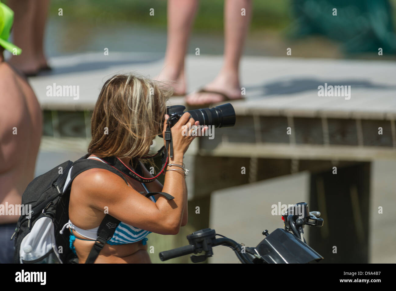 Femme photographe au courses de Jet Ski, Wooton Park Tavares, Florida USA Banque D'Images